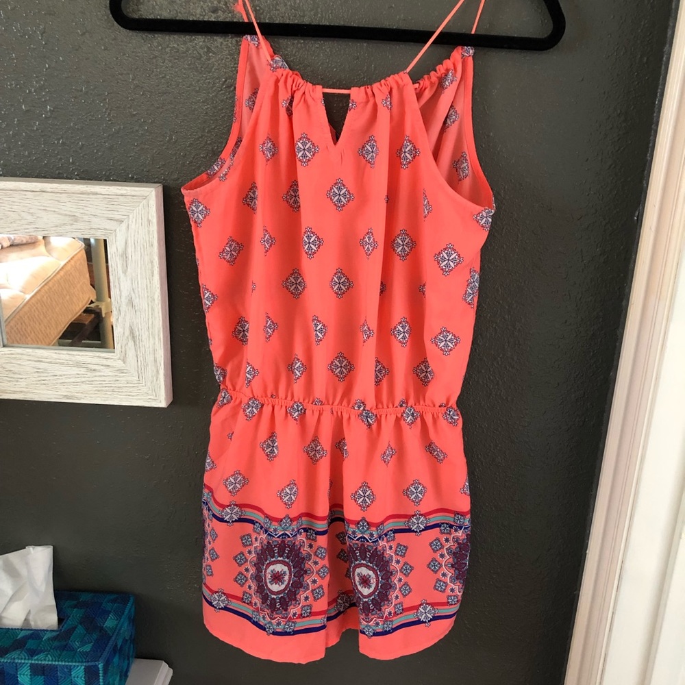 Cute, detailed, neon orange romper!